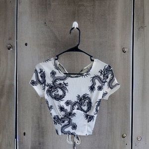 Crop top t-short with cut out back and criss cross straps.